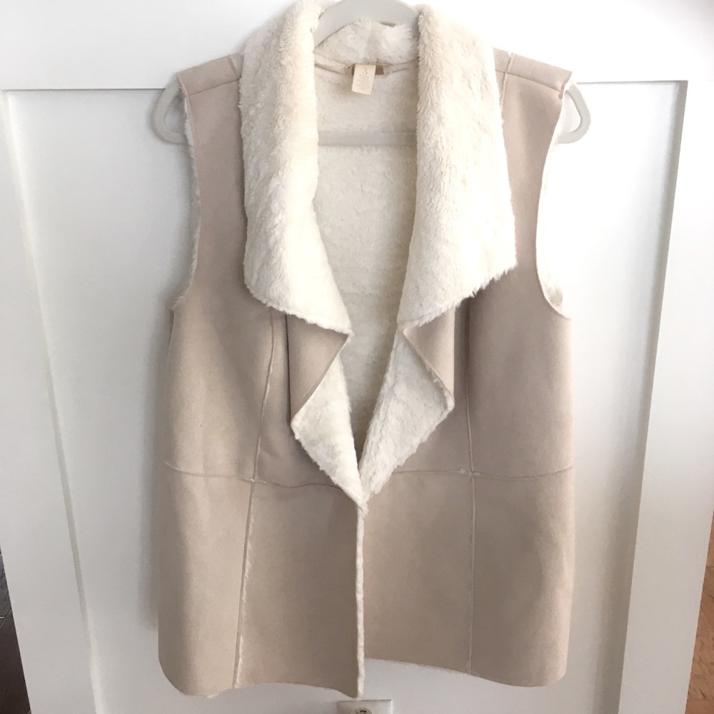 Chico’s Sherpa and suede beige vest.
